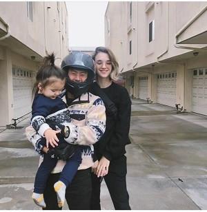 Justin Chon with his wife and daughter (Image: Instagram)